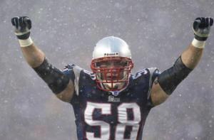 FOXBORO, MA - JANUARY 18: Linebacker Matt Chatham #58 of the New England Patriots celebrates against the Indianapolis Colts in the AFC Championship Game on January 18, 2004 at Gillette Stadium in Foxboro, Massachusetts. (Photo by Ezra Shaw/Getty Images)