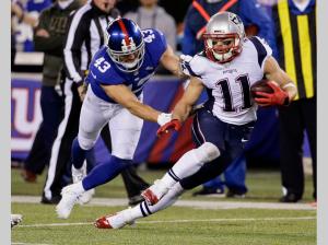 Julian Edelman is out with a broken foot ala Dez Bryant of the Cowboys (Photo: Julie Jacobson/AP))